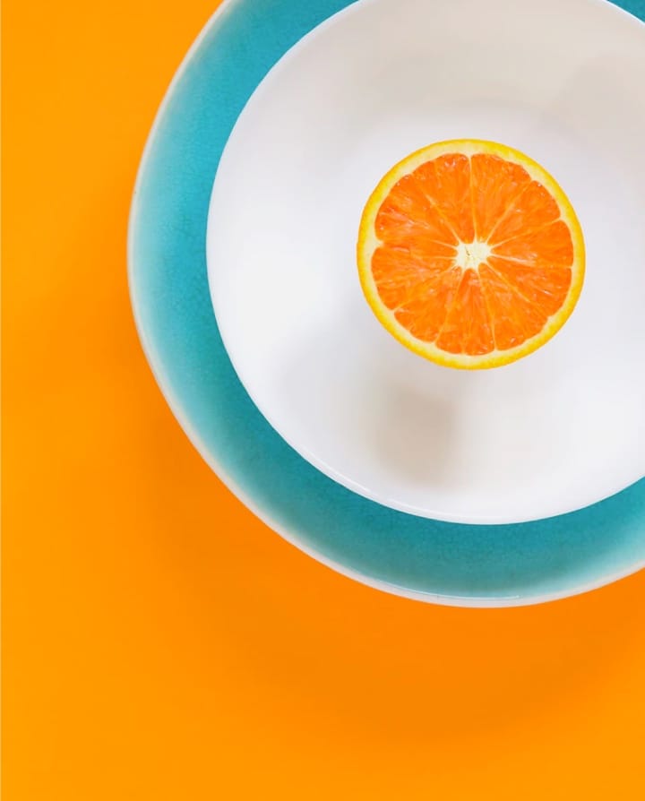 orange fruit image on a plate